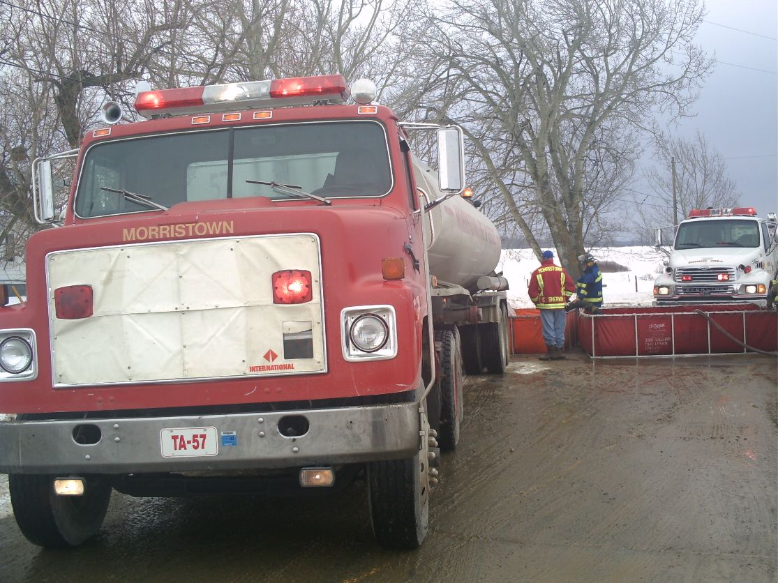 Morristown Tanker 57 (TA-57) dumping the 6,500 gallons of water it carries into the port-a-tank