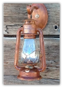 A Old Time Rustic Oil Lantern Electric Wall Sconce