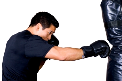 Boxer hitting bag with Bag Gloves