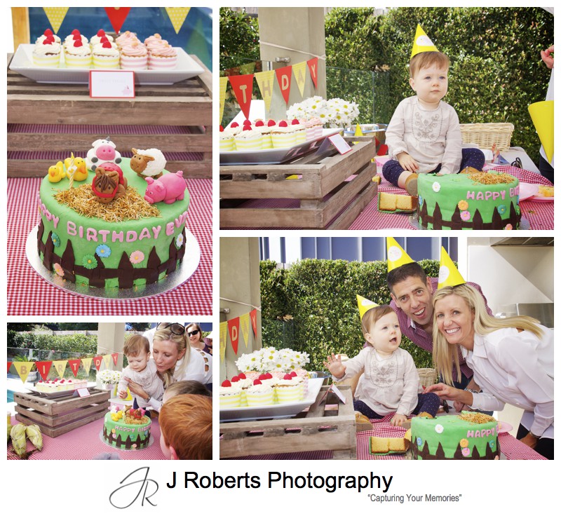 Little girl with her birthday cake on her 1st birthday - party photography sydney