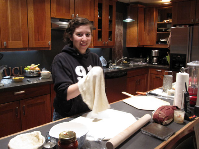 stretching pizza dough
