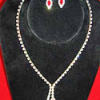 Rhinestone Necklace and Earrings Set with Splash of Red (SKU: JNKL-689)